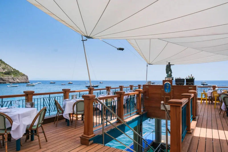 A seaside table on the Amalfi Coast reached only by boat