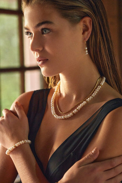 Lifestyle — Aline Pearls Necklace layered with gold jewelry